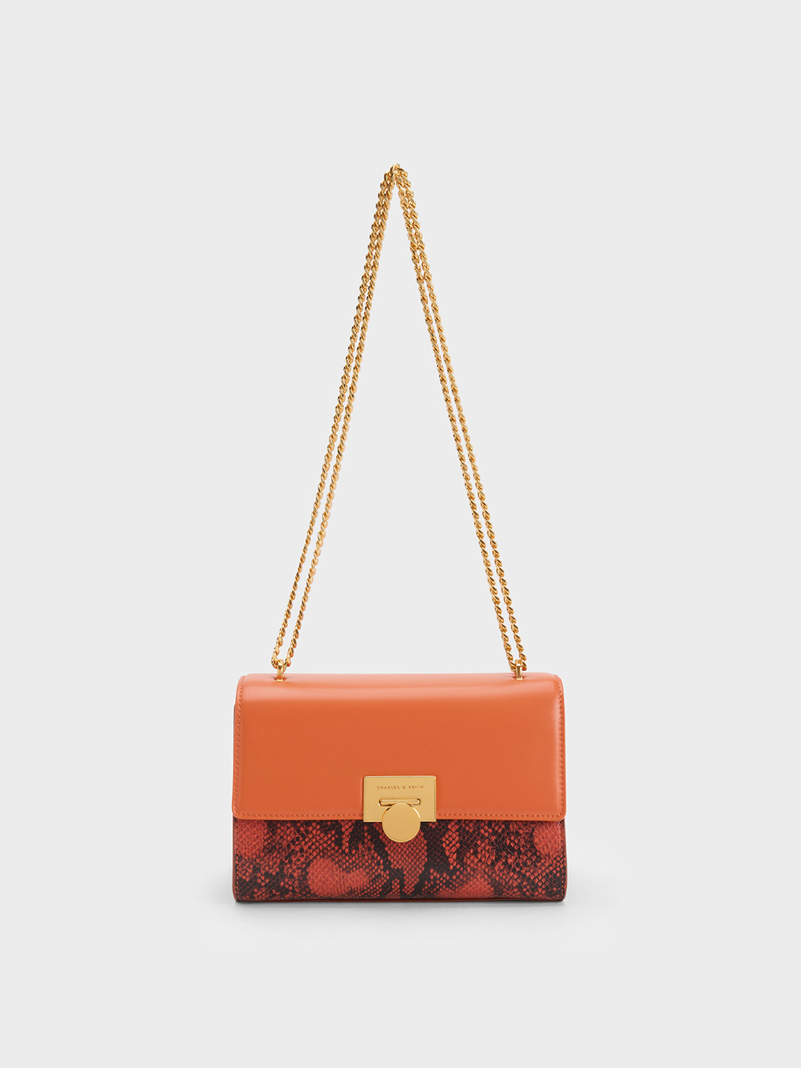 Orange Snake Print Metallic Accent Clutch - CHARLES & KEITH IN